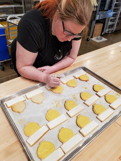 Three Dog Bakery Baker Decorating Treats