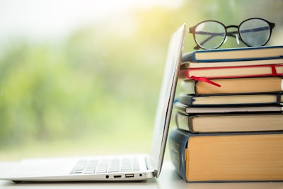 Stack Of Books Laptop Glasses