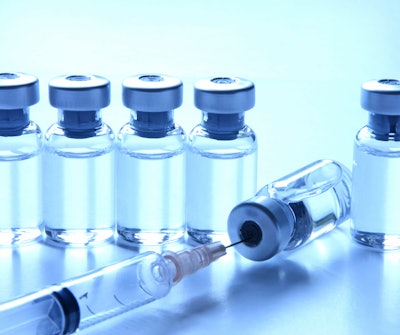 Vaccine Vials With Syringe