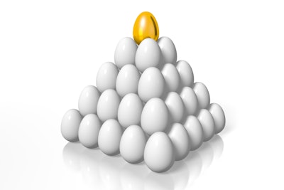 White Egg Pyramid Golden Egg Topped