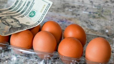 Bigstock Brown Eggs In Plastic Containe 471381051