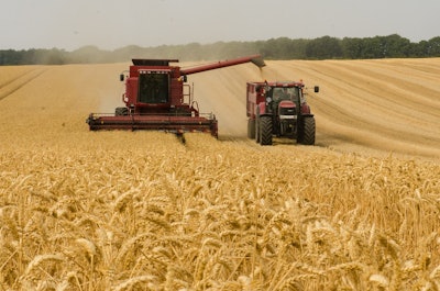 Golden Wheat Harvest With Tractor In Field Stanvpetersen Pixabay