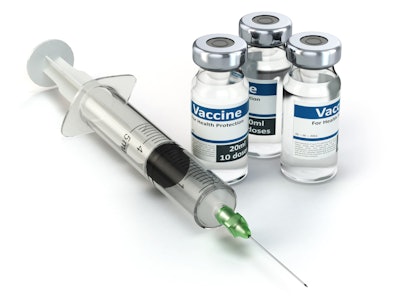 Syringe With Vaccine In Vials