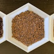 Wet, dry and dry and ground (left to right) grape pomace.
