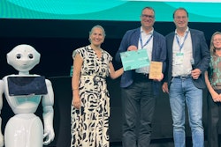 smaXtech CEO Stefan Scherer accepts the DSM-Firmenich Digital Distruptor award. From left, Corinne Bonadei, head of precision services at DSM-Firmenich Animal Nutrition and Health; Stefan Scherer, CEO strategy and sales at smaXtech; Franz Waxenecker, senior director precision services at DSM-Firmenich Animal Nutrition and Health; Dr. Eva Binder, head of translational science at DSM-Firmenich Animal Nutrition and Health.