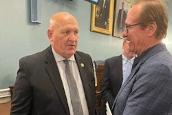 House Agriculture Committee Chairman Glenn Thompson, left, visits with Cooper Farms Chief Operating Officer Gary Cooper.