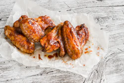 Baked Chicken Wings On Wooden Table