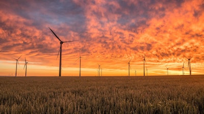 Windmills On Farm Sunset