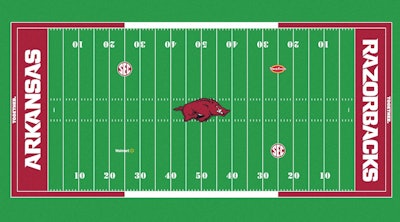 The Tyson Foods and Walmart logos appear on the 25-yard lines at the University of Arkansas Donald W. Reynolds Razorback Stadium.