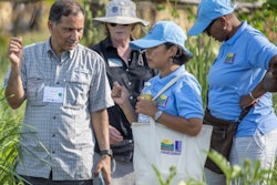 Vara Prasad, university distinguished professor and the R.O. Kruse endowed professor in K-State's agronomy department, will direct the new Climate Resilient Sustainable Intensification Innovation Lab, or CRSIIL, as part of USAID's Feed the Future program. Here, Prasad interacts with scholars at an agricultural technology park in Cambodia.