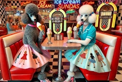 Dall·e 2024 12 03 11 35 28 A Kitschy 1950s Scene Featuring Two Poodles Eating Ice Cream Sundaes In A Classic American Diner The Diner Is Styled With Vibrant Chrome Accents, Neo