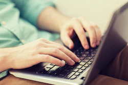 Typing On Laptop Computer