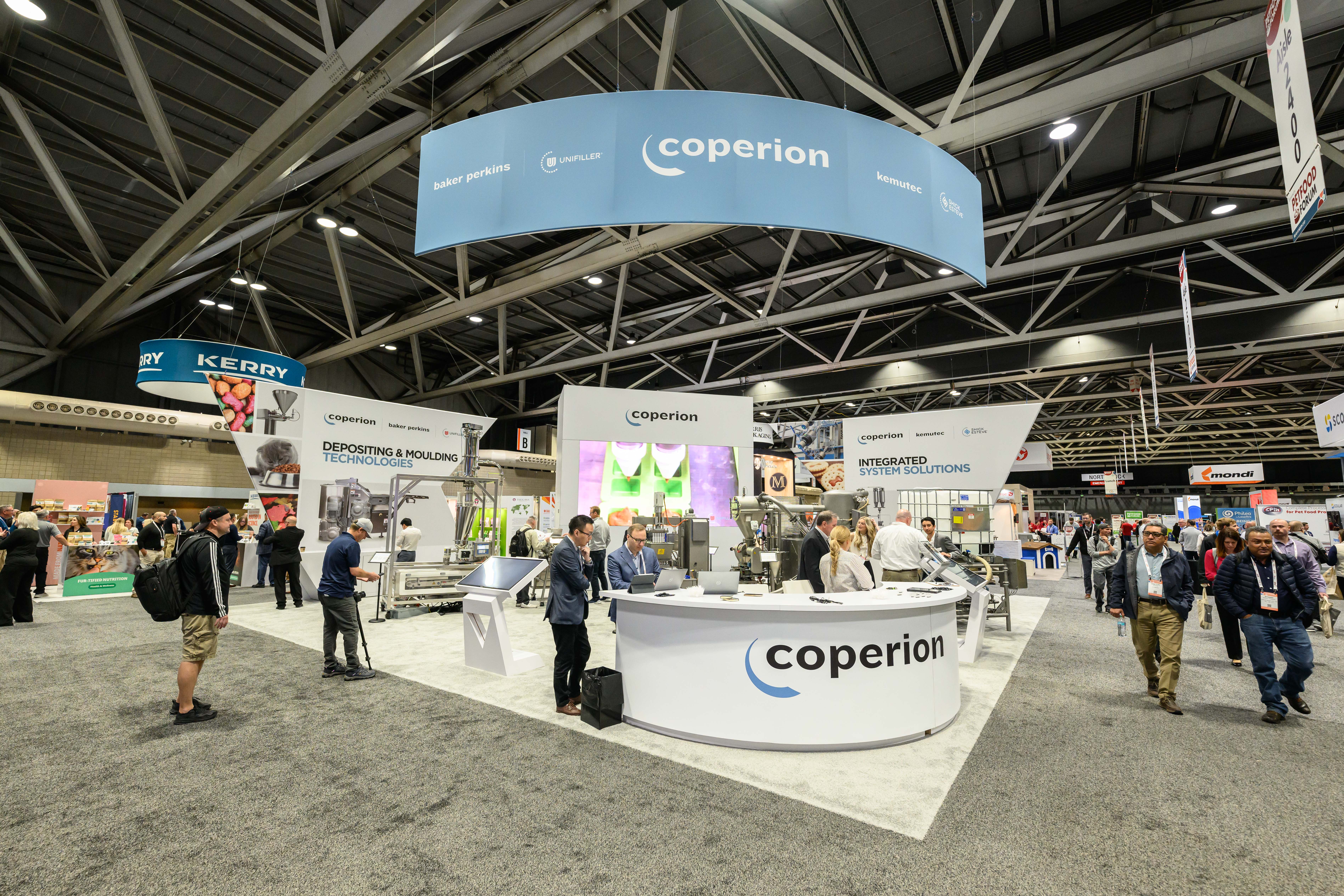 Coperion unified acquired brands Baker Perkins, Kemutec, K-Tron, Shick Esteve and Unifiller at Petfood Forum 2025.