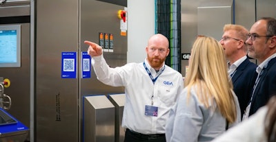 GEA test engineer Tim Morris shows the new facility to visitors.