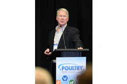 Speaker presenting at Poultry Tech Summit conference podium