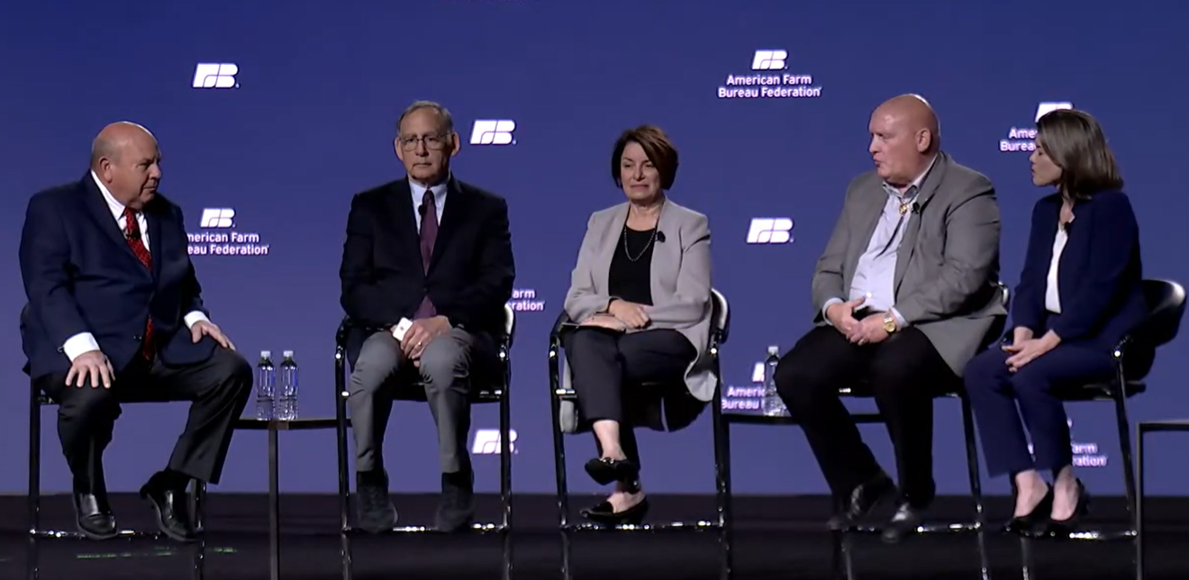 Zippy Duvall, Sen. John Boozman, Sen. Amy Klobuchar, Rep. GT Thompson and Rep. Angie Craig discuss legislative issues at the American Farm Bureau Federation Convention on January 11.