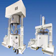 Large industrial mixing equipment with white Ross machinery and worker in safety gear