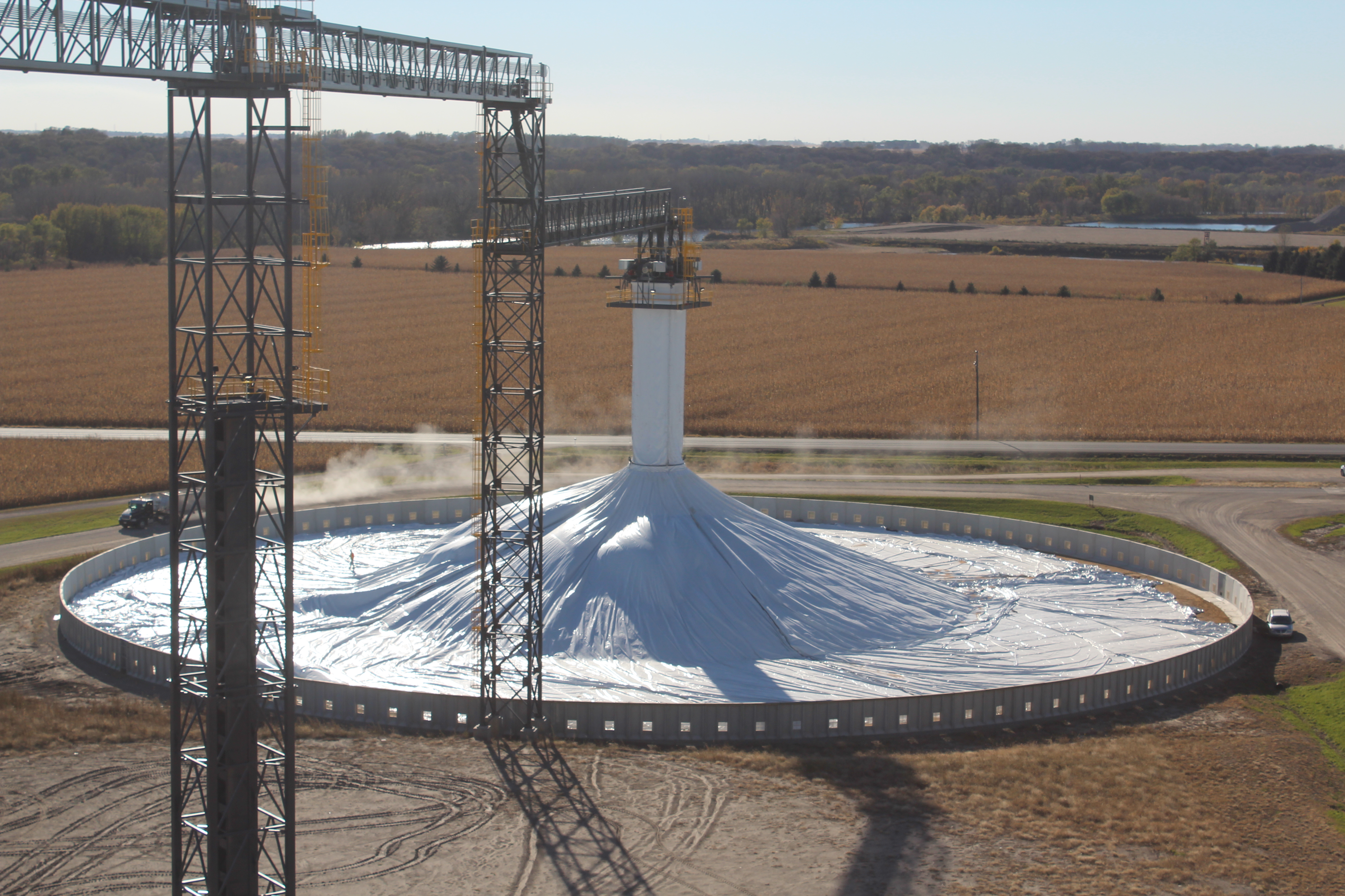 Covered ground pile being filled at harvest.