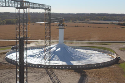Covered ground pile being filled at harvest.
