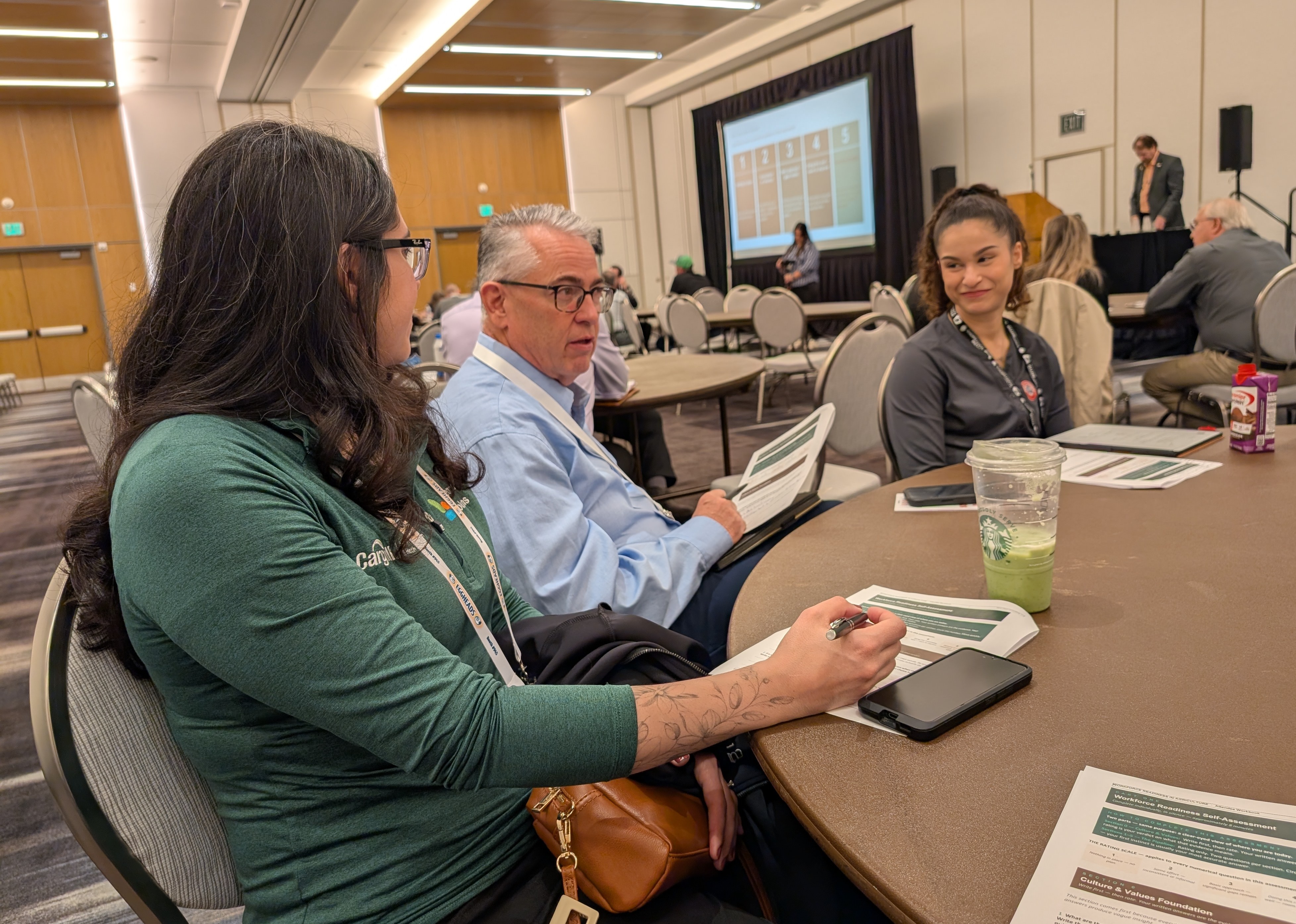 Attendees of the PEAK 2026 Coop of Leaders session discuss various workforce challenges.