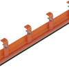 Orange snow plow blade with mounting brackets and black rubber edge