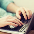 Typing On Laptop Computer